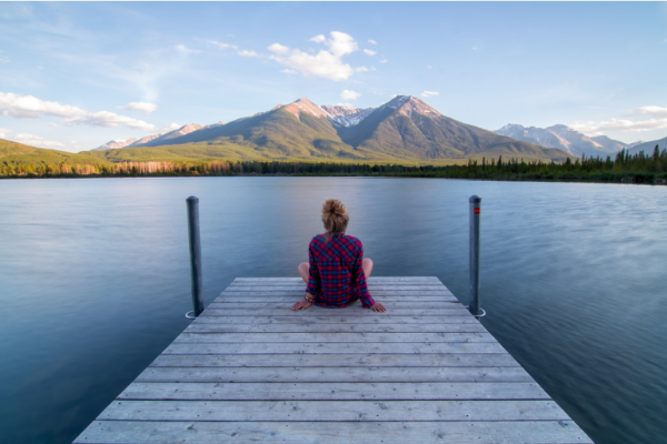 Woman Dock mountains serene happy