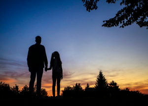 father daughter walk sunset