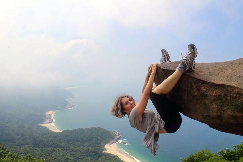 woman hike rock climb